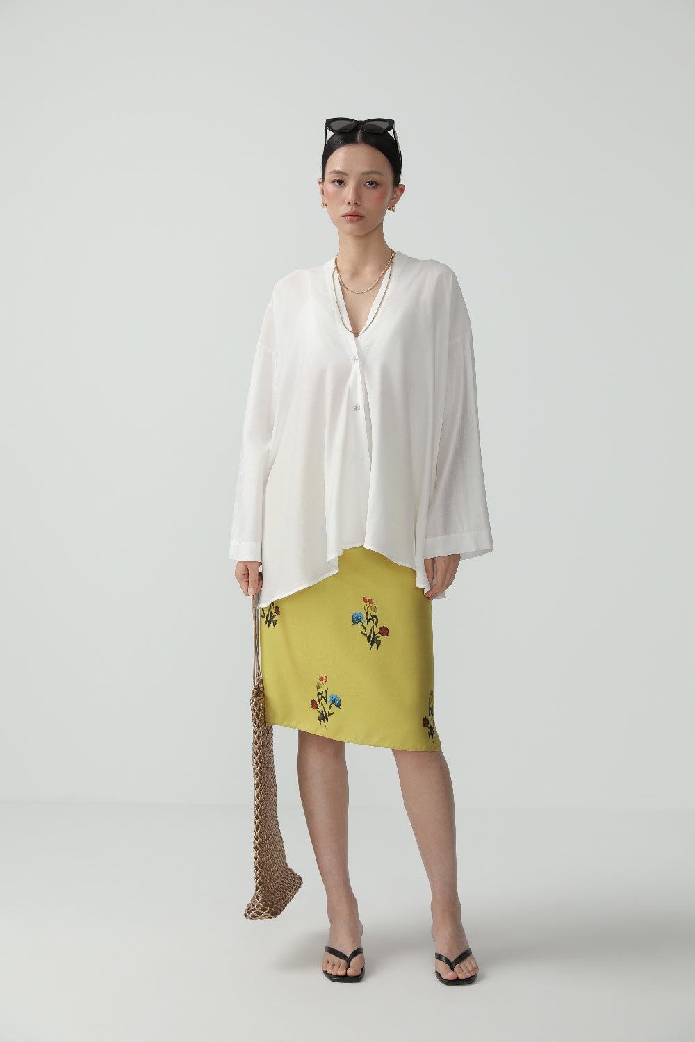 Elegant A-line Midi Skirt with Flowing Silhouette - Nettarei