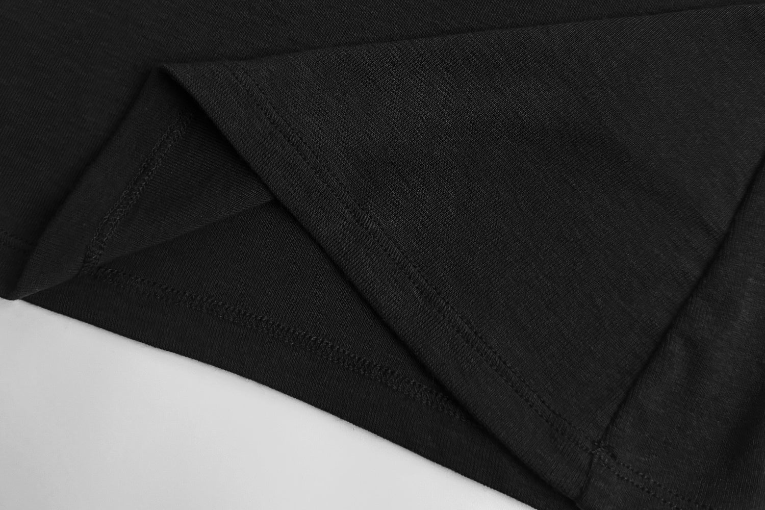 Sleek Fitted Batwing Top with Minimalist Charm - Nettarei
