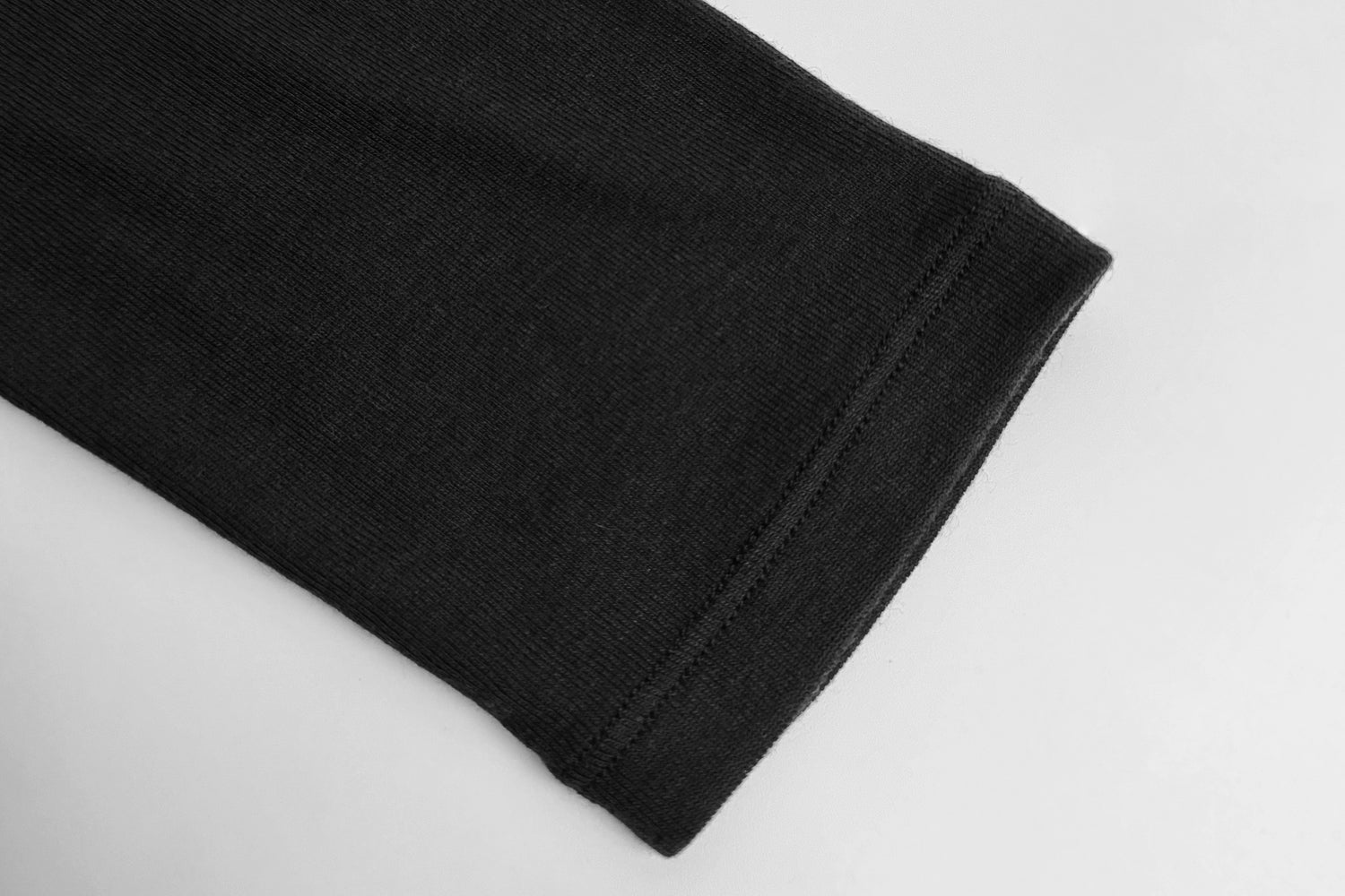 Sleek Fitted Batwing Top with Minimalist Charm - Nettarei