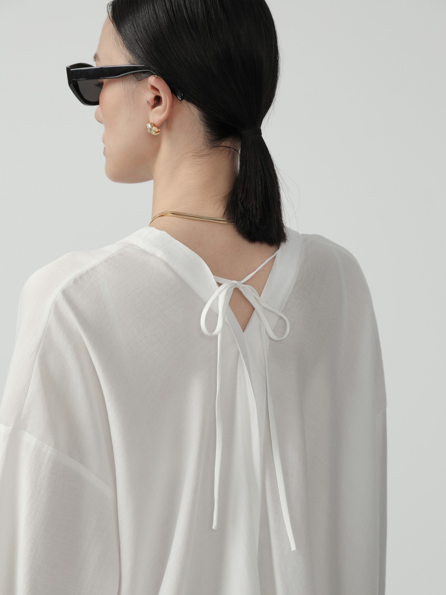 Sleek Minimalist Viscose Blend Poncho Cardigan - Nettarei