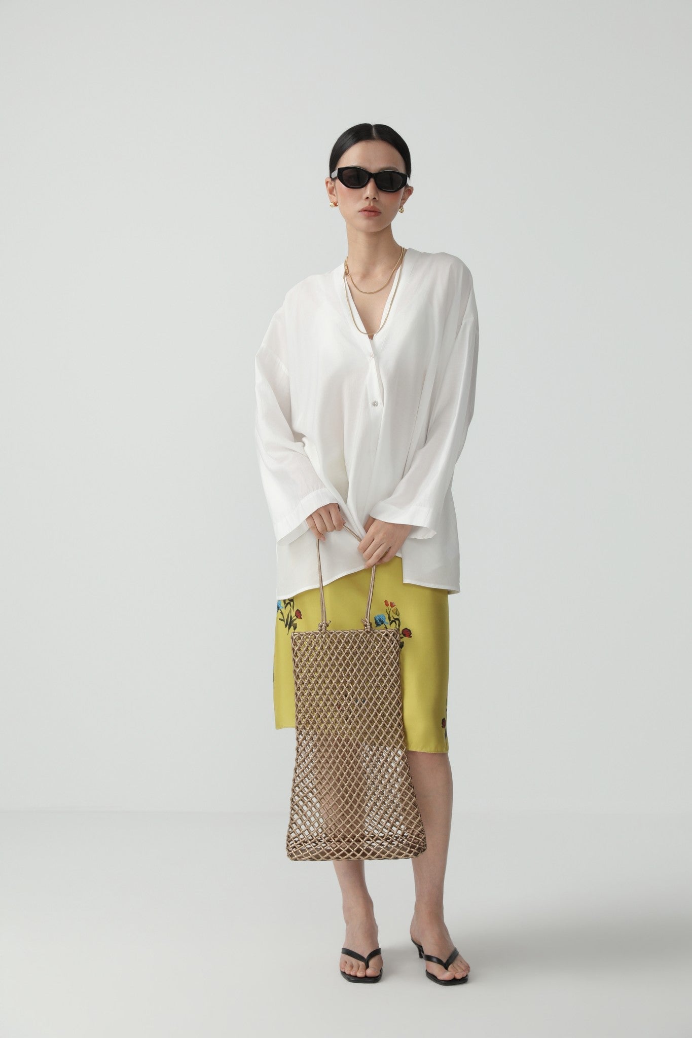 Elegant A-line Midi Skirt with Flowing Silhouette - Nettarei
