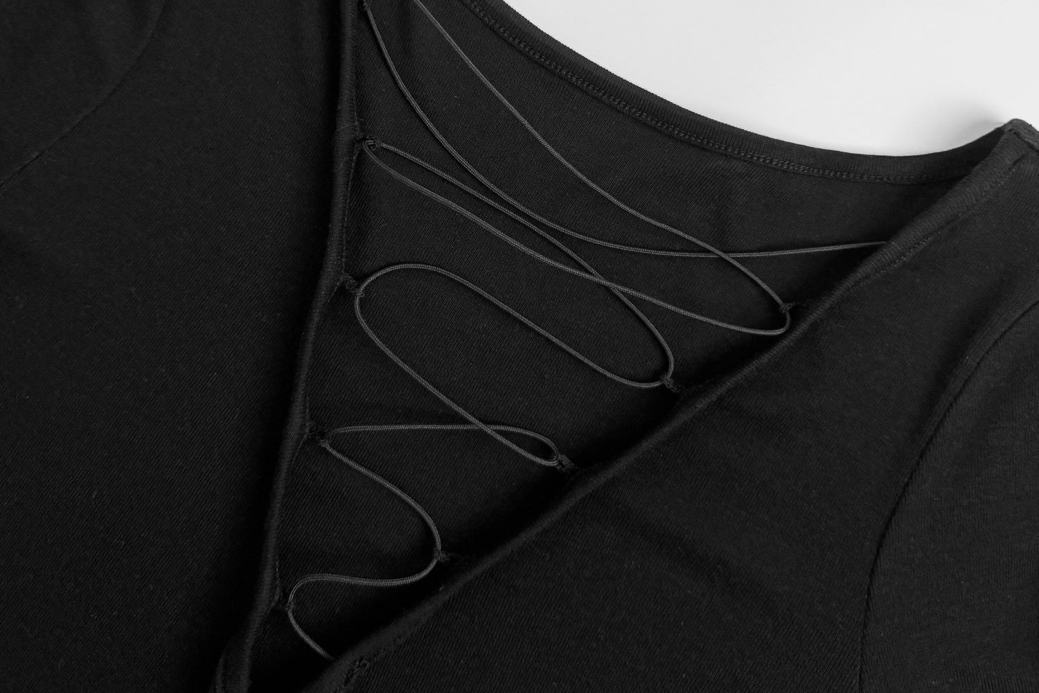 Sleek Fitted Batwing Top with Minimalist Charm - Nettarei