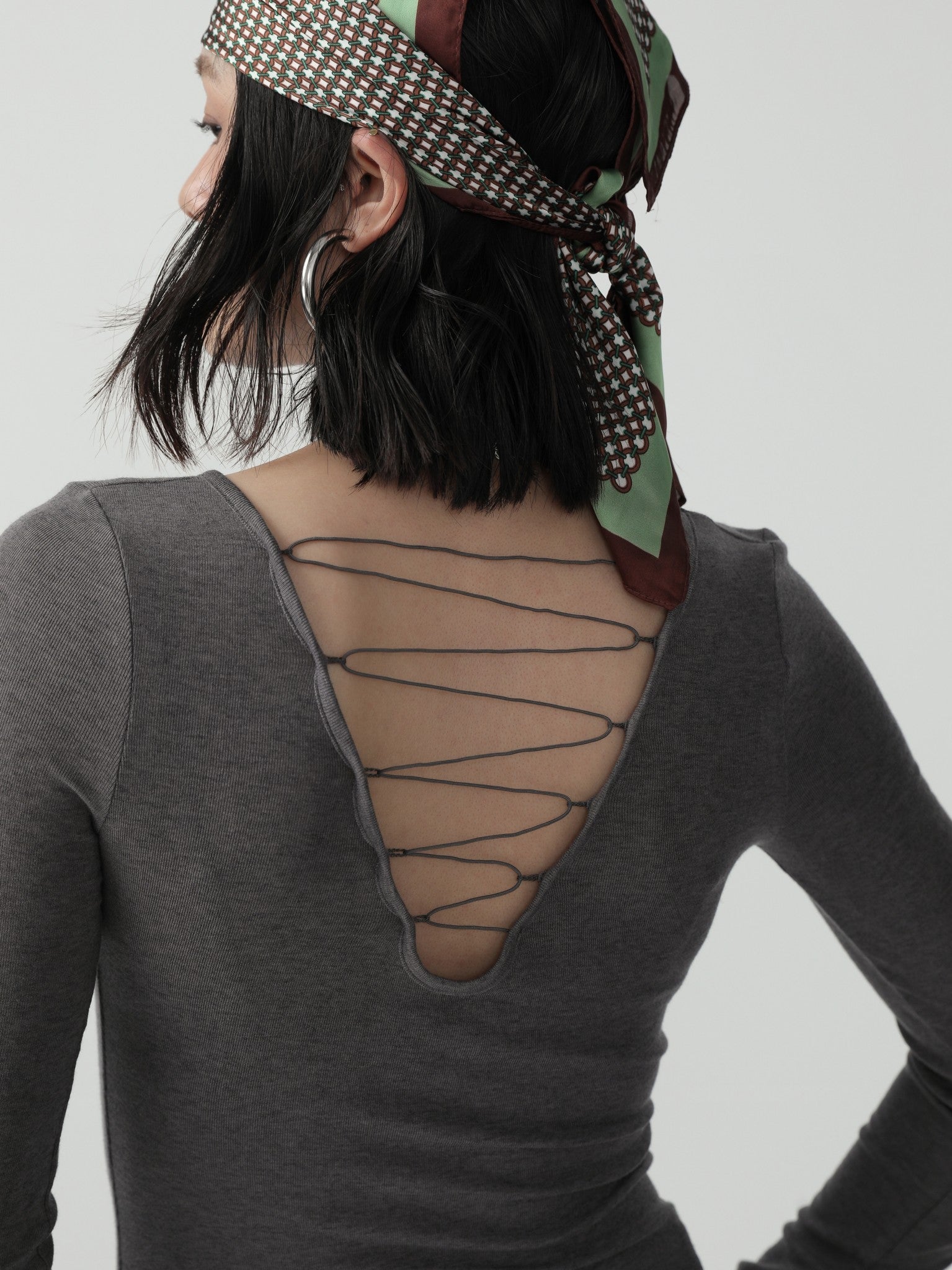 Sleek Fitted Batwing Top with Minimalist Charm - Nettarei