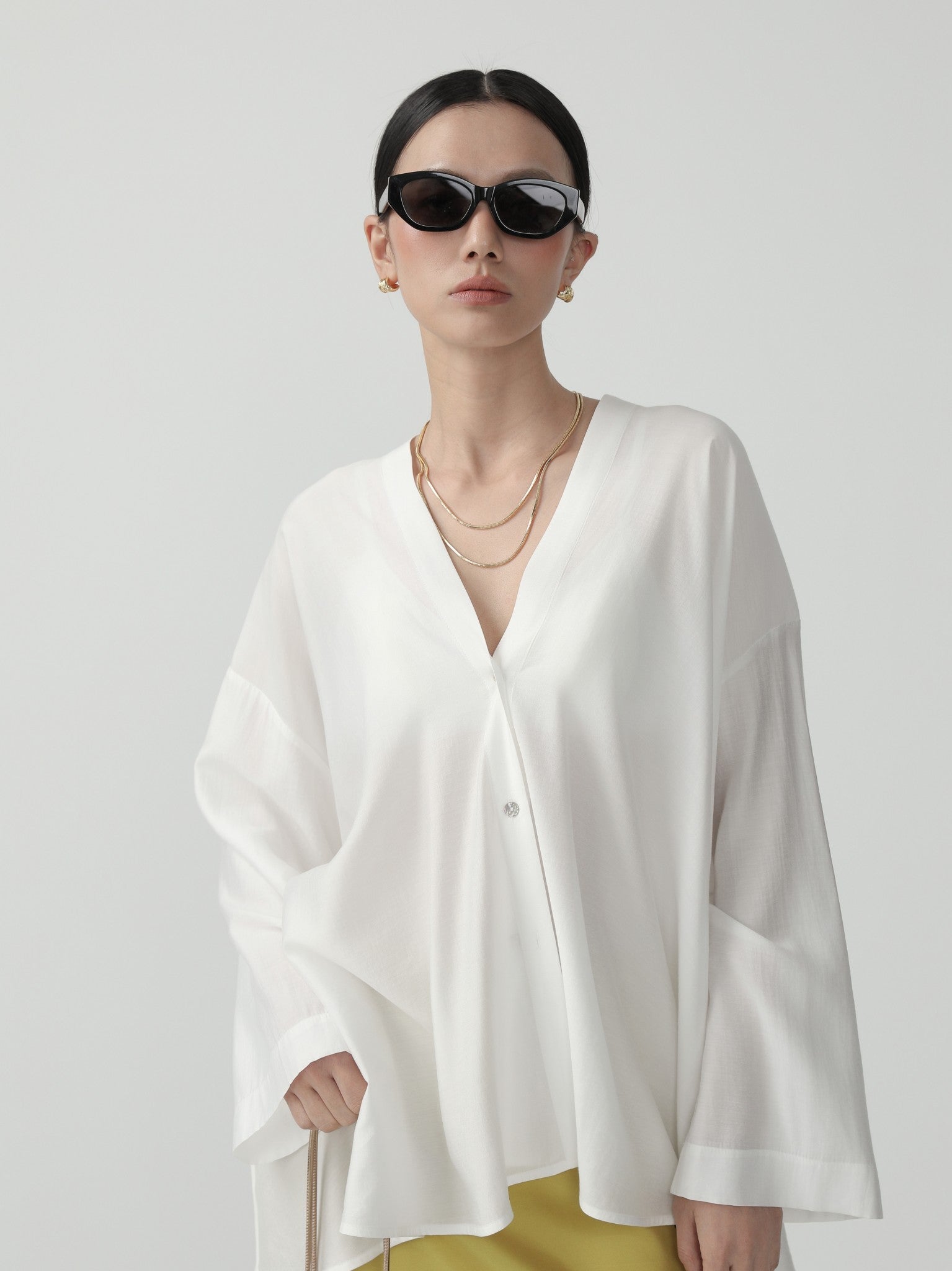 Sleek Minimalist Viscose Blend Poncho Cardigan - Nettarei